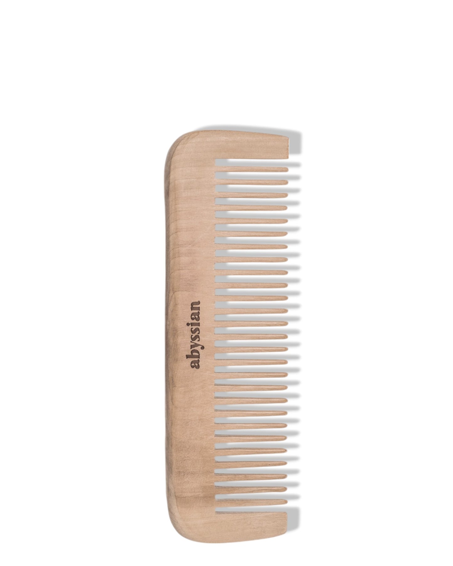 Peach wood comb with wide tooth