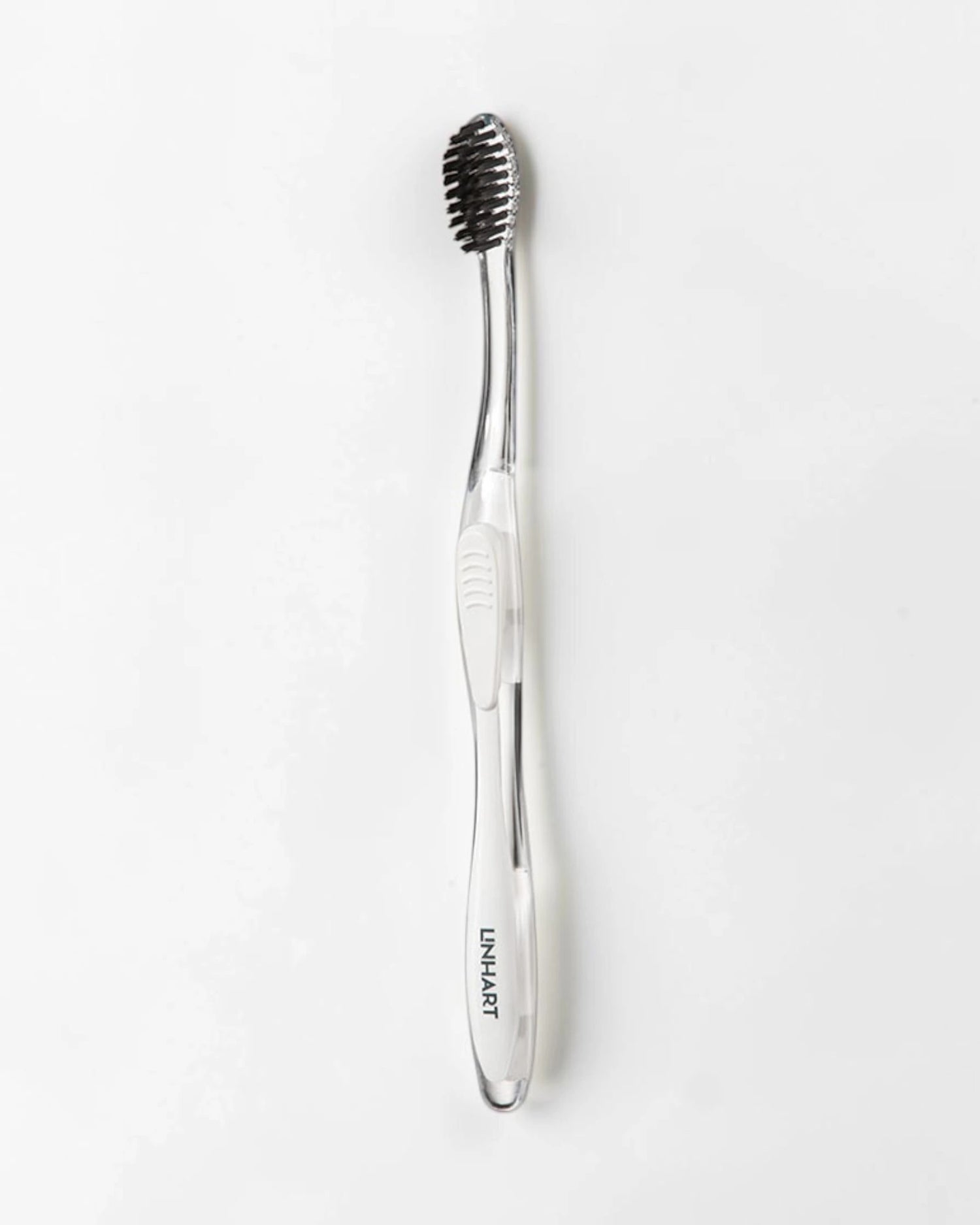 White Toothbrush w/Black Bristles