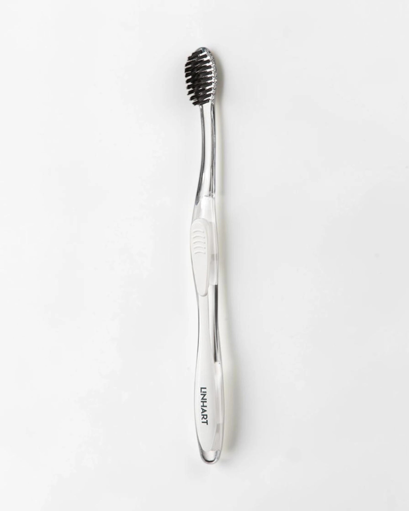 White Toothbrush w/Black Bristles