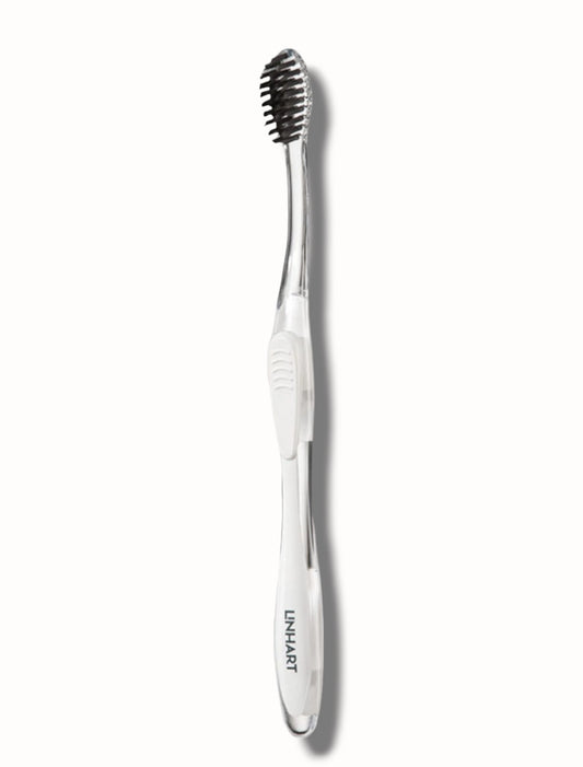 White Toothbrush w/Black Bristles